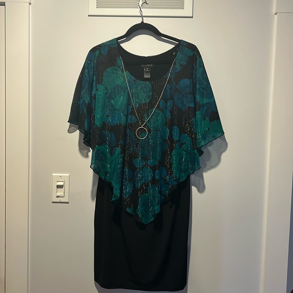 Ladies short dress with green sparkly overlay